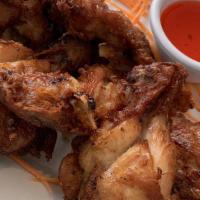 Ginger Wings · Family recipe, chicken wings and legs, crispy fried.