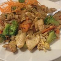 Pad See Ewe With Chicken · Stir fried wide rice noodles with eggs, broccoli and carrots in light soy sauce.