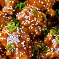 Sesame Chicken · Served with white rice or fried rice.