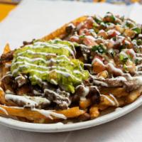 California Fries · Choice of protein (recommended: carne asada), seasoned French fries, queso, topped with pico...
