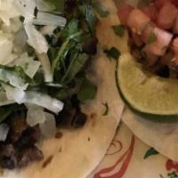 Chefs Tacos · Our special tacos, one with steak, one with chicken and one with pork, served with pico de g...