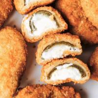 Jalapeño Poppers (7 Pieces) · Served with ranch.