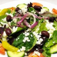 Greek Salad · Fresh greens, tomatoes, cucumbers, red onions, pepperoncini, feta cheese, black olive, and G...