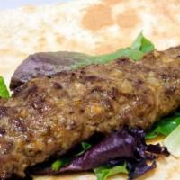 Beef Koobideh Skewer · Ground beef, onions, and a mix of special spices.