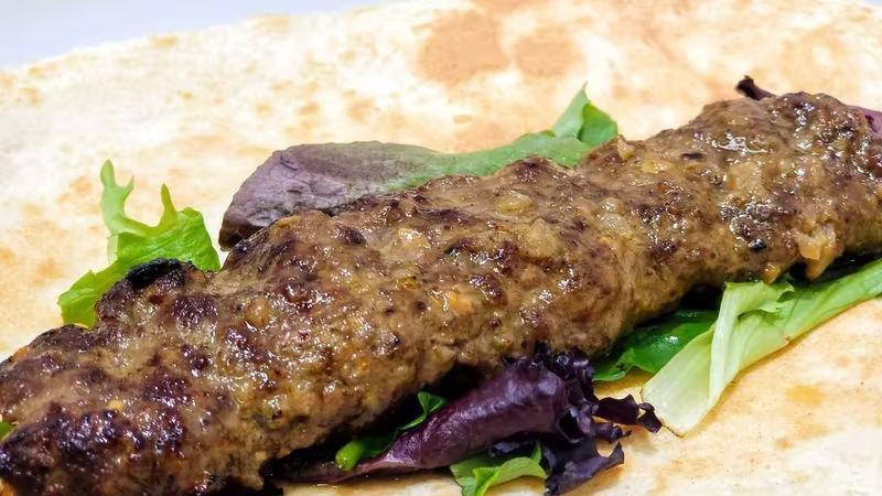 Beef Koobideh Skewer · Ground beef, onions, and a mix of special spices.
