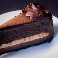 Chocolate Cake · Flourless, gluten free cake baked with Belgian semi sweet chocolate for a rich flavor and a ...