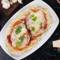 Chicken Parmesan · Parmesan chicken breast over spaghetti, topped with marinara served with a side of fresh-bak...
