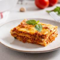 Beef Lasagna · Layers of pasta filled with minced beef, marinara, and cheese then baked to perfection and s...