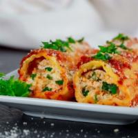 Cheese Manicotti · Rolled up pasta filled with ricotta and mozzarella cheese then topped with marinara sauce an...