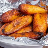 Fried Plantains · Sweet banana-like strips fried to perfection.