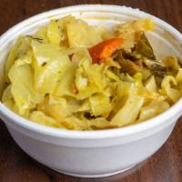 Cabbage · Medley of cabbage, carrots, onions, red and green peppers with tropical spices. An islander ...