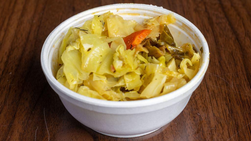 Cabbage · Medley of cabbage, carrots, onions, red and green peppers with tropical spices. An islander original.