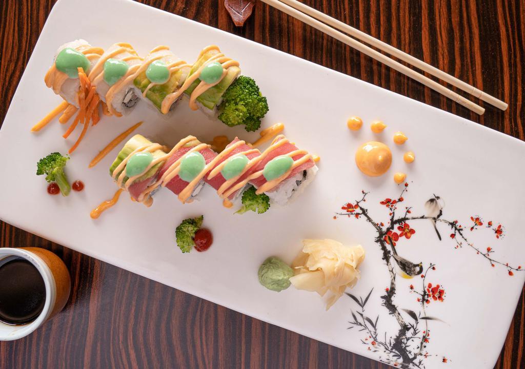 Kill Bill Roll · Spicy crabmeat, cucumber, and cream cheese inside, top with tuna, avocado, and white tuna, served with spicy mayo and honey wasabi sauce.