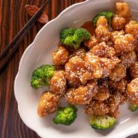 Sesame Chicken · Served with pork fried rice or white rice.
