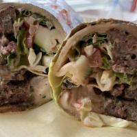 Beef Shawarma Sandwich · Beef wrapped in pita bread with lettuce, tomatoes, and tzatziki sauce. Served with your choi...