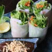 Fresh Rolls · Rice paper wrapper filled with Chicken, lettuce, carrots, Thai basil, served with a tasty ho...