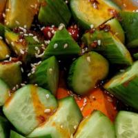 Spicy Cucumber Salad · Fresh cucumber with sesame seed and slightly spicy crunchy garlic Chili sauce.