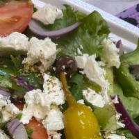 Greek Salad · Mixed green lettuce, red tomato, chilled cucumbers, feta cheese, imported kalamata olives, s...