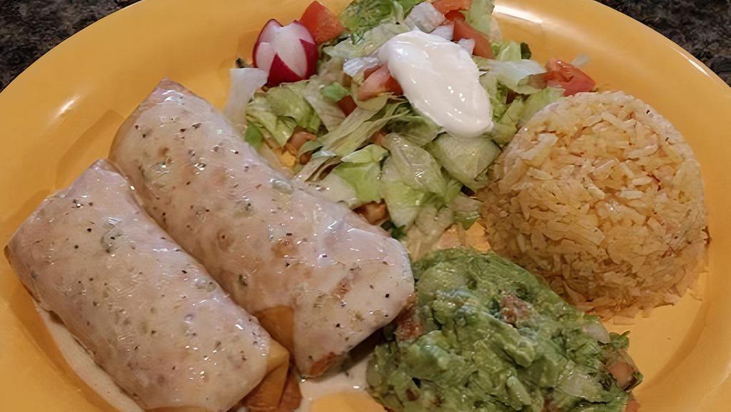 Chimichangas · Choice of 2. Chicken, ground beef or veggie served with rice, salad and a side of guacamole.