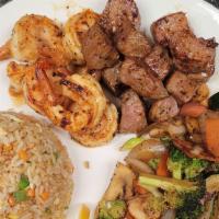 Hibachi Combo · Choose 2 items of ( chicken, shrimp, steak), Served with miso soup, house salad, fried rice