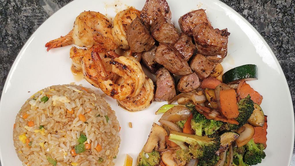 Hibachi Combo · Choose 2 items of ( chicken, shrimp, steak), Served with miso soup, house salad, fried rice