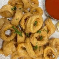 Golden Fried Calamari · Tender pieces of squid soaked in chef's special batter and fried to golden brown.