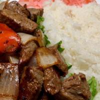 Cơm Bò Lúc Lắc · Cubed sesame beef sautéed with bell peppers and onions with jasmine rice.