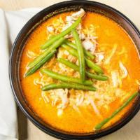 Curry Kick · Hot. One of our customer's favorite noodle soups, packed with chicken, herbs and string bean...