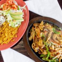 Mojito Fajita · your choice of chicken, or steak fajita topped with bellpepper and onions.... served with ri...