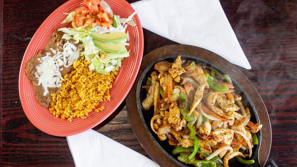 Mojito Fajita · your choice of chicken, or steak fajita topped with bellpepper and onions.... served with rice, beans and salad