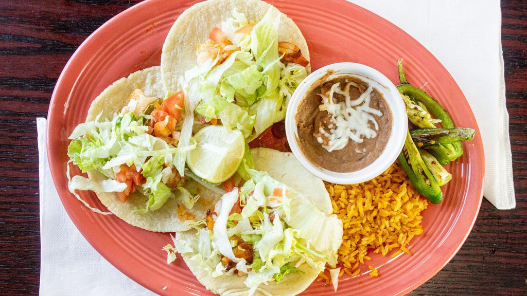 Fish Or Shrimp Taco · Three tacos filled with grilled fish or grilled shrimp