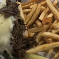 Philly Cheese Fries · Fresh  french fries topped with Philly steak, grilled peppers and grilled onions covered in ...