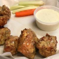Boneless Wings · Tossed in your choice of sauce. With carrots, celery and dipping sauce.