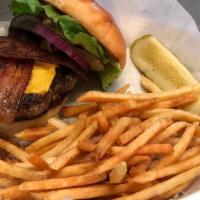 Juicy Brewski · Cheese and pepper stuffed Angus beef topped with bacon, American cheese, lettuce, tomato, pi...