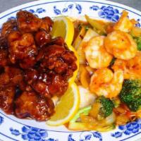 Dragon & Phoenix · Hot & Spicy. Shrimp w. mixed Chinese veges & chunk chicken deep fry with spicy sauce.