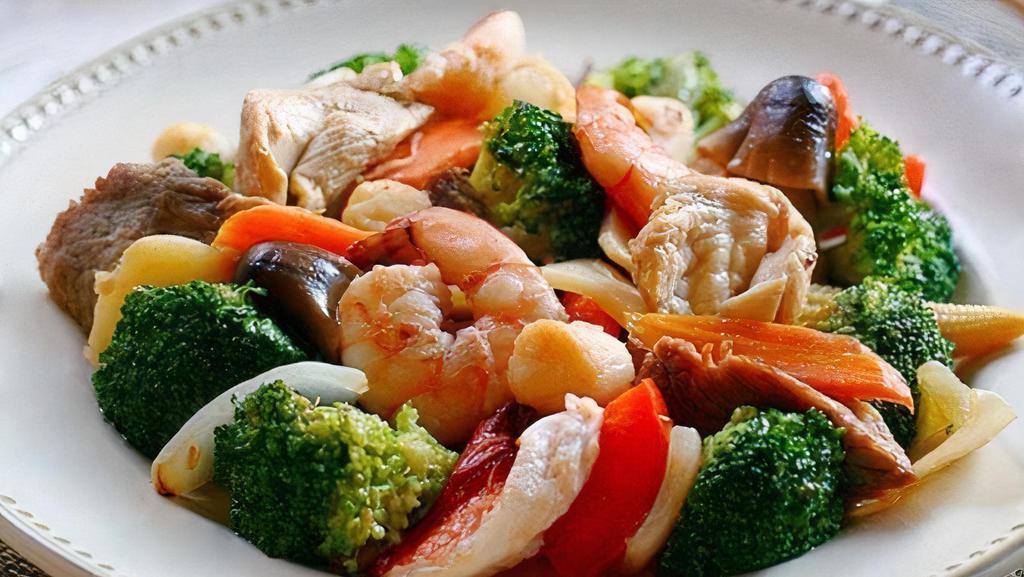 Four Seasons · Beef, chicken shrimp, pork and mixed vegetables in special brown sauce.