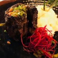 Churrasco · Skirt steak marinated with Asian Latin seasoning served with yucca mash.