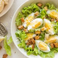 Caesar Salad · A bed of crisp Romaine lettuce topped with a freshly grated parmesan cheese freshly ground b...