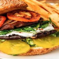 Portabella Burger · Vegetarian. A vegetarian delight, fresh black beans, roasted corn, and tomato patty dressed ...