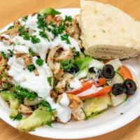 Chicken Shawarma Plate · Chicken cook with onions, green pepper, tabouli, tomatoes,  and the shawarma a  spicy on the...