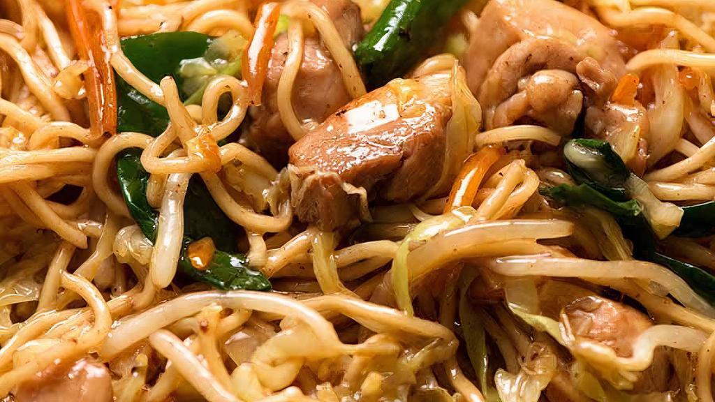 Chicken Chowmein · Dry noodles soaked in hot water and fried with mixed vegetables and chicken in frying pan.