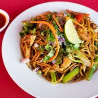 Chowmein · Dry noodles soaked in hot water and fried with mixed vegetables in frying pan.