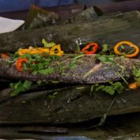 Steamed Fish In Banana Leaves · Gluten-free.   Fresh sea bass steamed with ginger,   scallions, cellophane noodle and mushro...