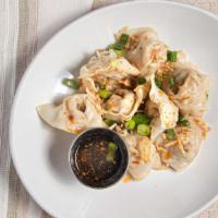 District 6 Wontons (8) · Spicy.  Steamed wontons filled with pork and shrimp topped with crispy shallots,  fried garl...