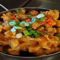 Sweet & Spicy Cauliflower · Spicy. Gluten-free.  Crunchy fried cauliflower drizzled with sweet & spicy sauce topped with...