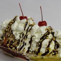 Banana Split · Comes with banana, strawberry, pineapple, Hershey's syrup, chopped nuts, whip cream and cher...