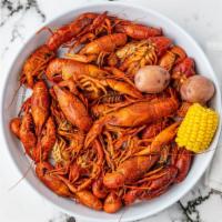 Boiled Crawfish Boat · 2 pounds with corn and potatoes.