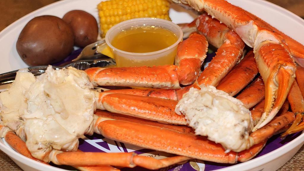Dungeness Crab Legs · Cajun boiled dungeness crab legs 1 3/4 pounds served with corn, potatoes, and drawn butter.