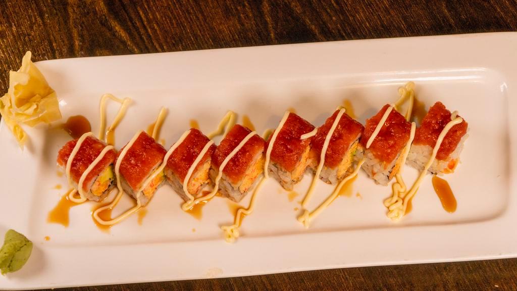 Virginia Roll · Spicy crab and avocado, crunch inside with spicy tuna on top.