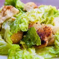 Caesar Salad · Classic Caesar salad with croutons, dressing on the side.